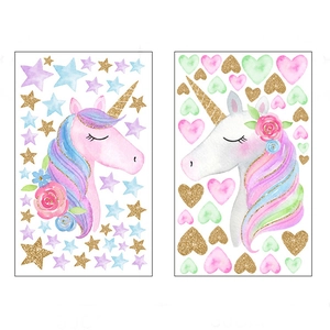 Luminous gold and green unicorn wall stickers with watercolor floral and star patterns