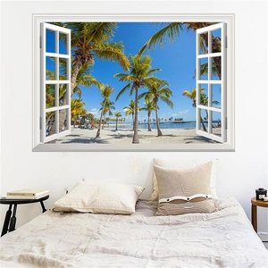 Detail of 3D window beach wall sticker showing palm trees and blue ocean view in a bedroom