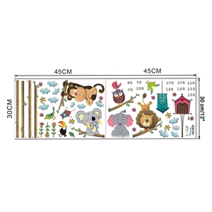 Detailed view of cartoon animal height chart wall stickers with elephant and lion motifs