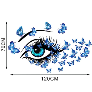 Detailed wall sticker dimensions showing 120cm width by 70cm height with blue butterfly eye