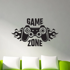 Matte black Game Zone wall decal with controller and flame design over a green sofa