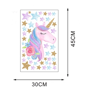 Detailed dimension guide for unicorn and stars wall decal showing 30x45cm size