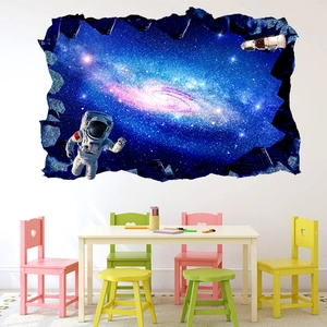 Detail of 3D space wall sticker showing astronaut and galaxy in a kid room scene
