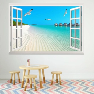 Detail of 3D tropical beach window wall sticker showing sand, ocean and seagulls