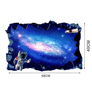 Detailed view of 3D galaxy wall sticker with astronaut and space station at 58x40cm size