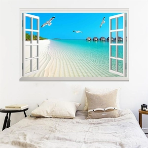 Detail of 3D window wall mural showing beach resort scenery over a bedroom bed