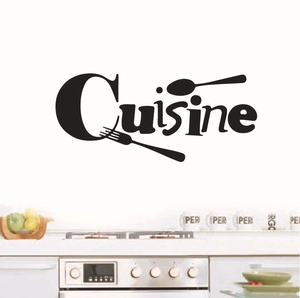 Detail showing Cuisine wall sticker with fork and spoon icons on a kitchen wall surface
