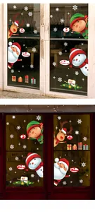 Stickers de Noël avec Père Noël et renne sur porte blanche et cadre en bois sombre