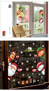 Gros plan d'autocollants de Noël pour vitres avec Père Noël, rennes et flocons