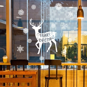 White Christmas reindeer window stickers with Merry Christmas text and snowflakes