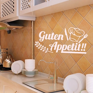 Guten Appetit kitchen wall decal with chef hat and cutlery icon on orange tile