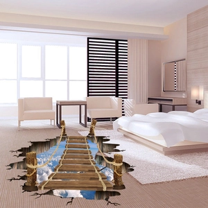 Detail eines 3D-Bodenaufklebers mit realistischer Holzbrücke und blauem Himmel