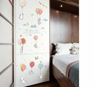 Flying rabbit wall decals for kids bedroom featuring balloons and clouds decoration