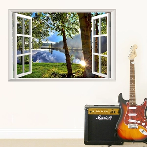 3D lake view wall sticker with white window frame shown in a creative home studio setting
