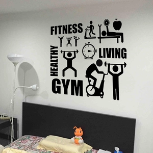 Detalle de vinilos de pared fitness negros con iconos de gimnasio y texto de vida sana