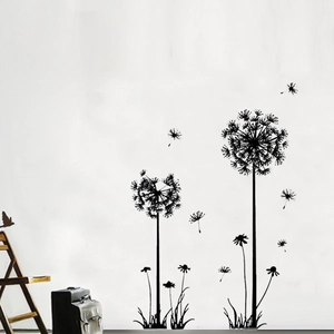 Modern dandelion silhouette wall decal with blowing seeds for living room background