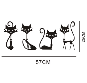 Detailed size chart for black cartoon cat PVC wall stickers showing 57cm by 25cm dimensions