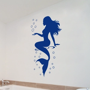 Dark blue mermaid silhouette wall sticker with bubble decals on a white bathroom wall