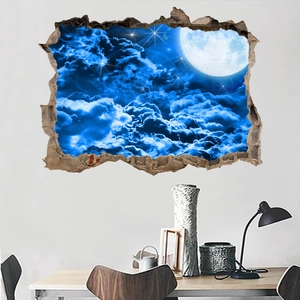 Detail view of 3D moon and starry sky wall decal with a realistic broken wall effect
