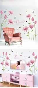 Detail showing pink lily flowers and butterfly wall decals in a living room setting