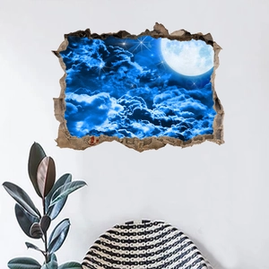 Macro shot of 3D cracked wall sticker showing a realistic starry night and moon