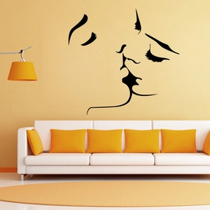 Modern black line art wall sticker featuring a romantic abstract couple kissing silhouette