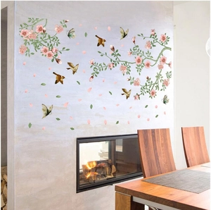 Detailed wall sticker showing pink cherry blossoms, brown birds, and flying petals