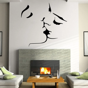 Detail of minimalist couple kissing line art wall sticker in a modern living room
