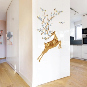 Golden jumping deer wall decal with blue floral antlers and white doves for home decor