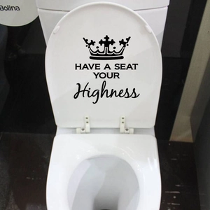 Creative toilet lid decal with crown and Have a Seat Your Highness humorous lettering