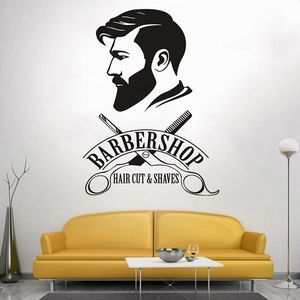 Sticker mural barbier avec profil masculin et outils sur fond de mur blanc