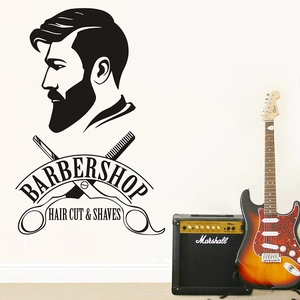 Sticker mural barbier avec silhouette vintage et ciseaux sur un mur blanc de salon