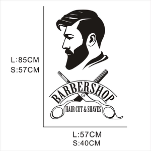 Détail de l'autocollant mural Barbier montrant ciseaux, peigne et texte Hair Cut Shaves