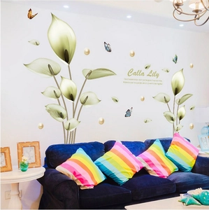 Calla Lily wall stickers with butterflies and gold pearls on a white living room wall