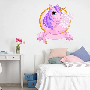 Pink cartoon unicorn wall decal with golden horn in a cozy minimalist bedroom setting