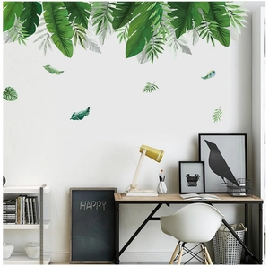 Vue détaillée de stickers muraux de feuilles tropicales dans un bureau de style scandinave