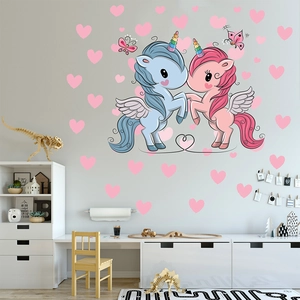 Detail view of cute pink and blue cartoon unicorn wall stickers for nursery wall decor
