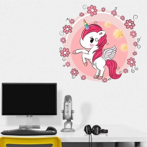 Detail of pink cartoon unicorn wall sticker with stars and flowers on a white wall
