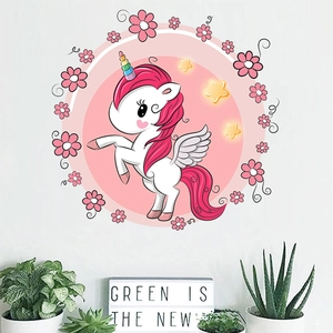 Detailed view of pink flower unicorn wall sticker on white wall for kids room decor