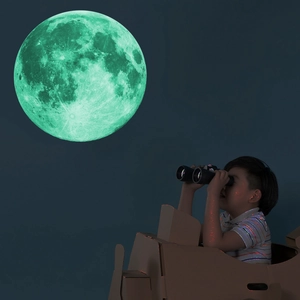 Luminous glow-in-the-dark moon wall sticker with green light for kids' bedroom