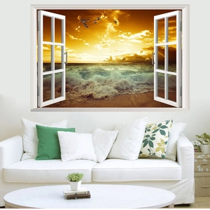 Detail of 3D window wall sticker showing a golden sunset beach with seagulls and waves