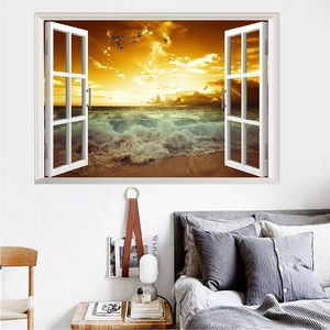 3D ocean beach sunset fake window wall sticker shown in a warm bedroom scene