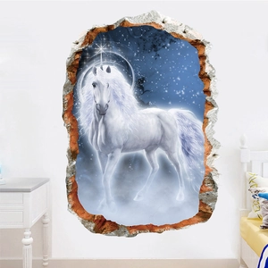 3D wall sticker showing a white unicorn through a cracked stone wall in a kid's starry bedroom
