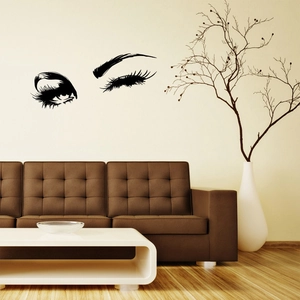 Artistic eye silhouette wall decal with long lashes and eyebrows for modern living rooms
