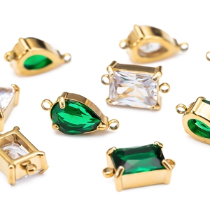 Connecteurs en acier doré avec cristaux verts et clairs pour la fabrication de bijoux