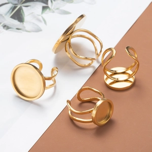 Adjustable gold stainless steel ring blanks with round bezel settings for DIY jewelry
