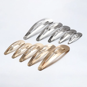 Assorted gold and silver metal teardrop snap hair clips in various sizes for DIY styling