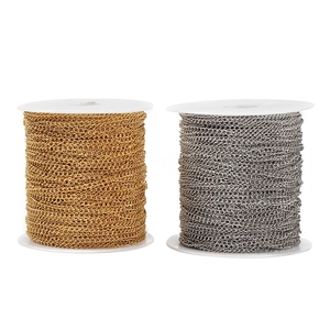 DIY jewelry making O-link chains in gold and silver finish on white spools
