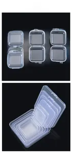 Macro detail of various sized transparent PP plastic storage boxes with flip lids