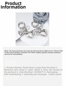 Detailed view of silver heart bow pendant made of zinc alloy for keychains and accessories